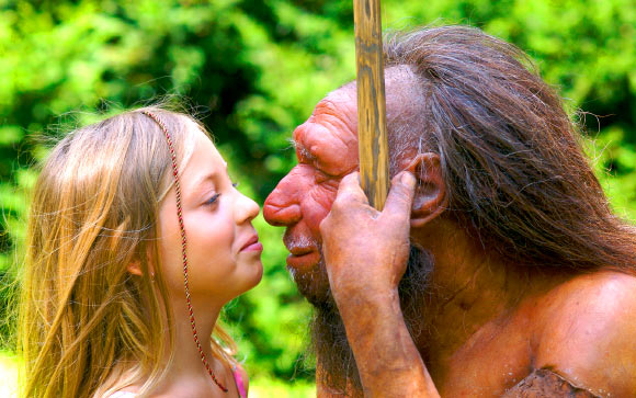 This image shows a Neanderthal and a human kid. Image credit: Neanderthal Museum.