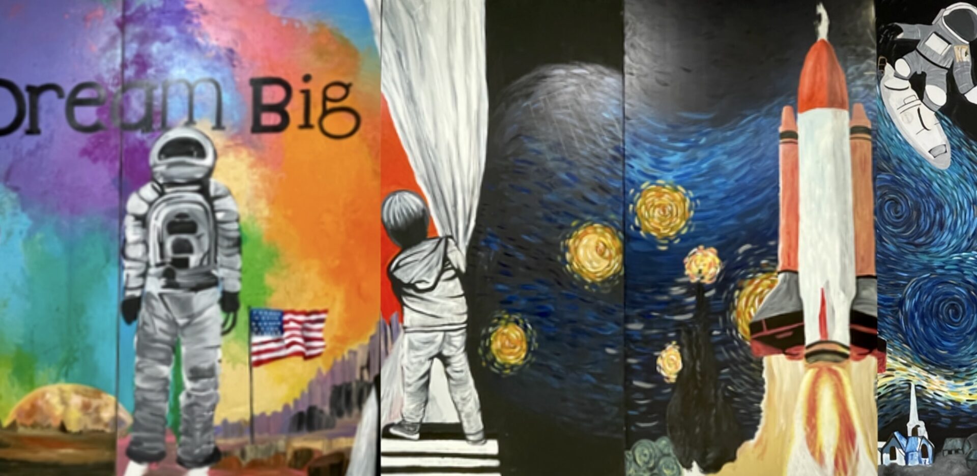 A colorful art mural representing space exploration. The words "Dream Big" appear in the upper left corner.