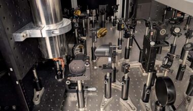 An experimental setup showing mirrors to guide and focus ultrashort light pulses onto the magnet. Image credit: Lancaster University