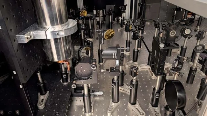 An experimental setup showing mirrors to guide and focus ultrashort light pulses onto the magnet. Image credit: Lancaster University