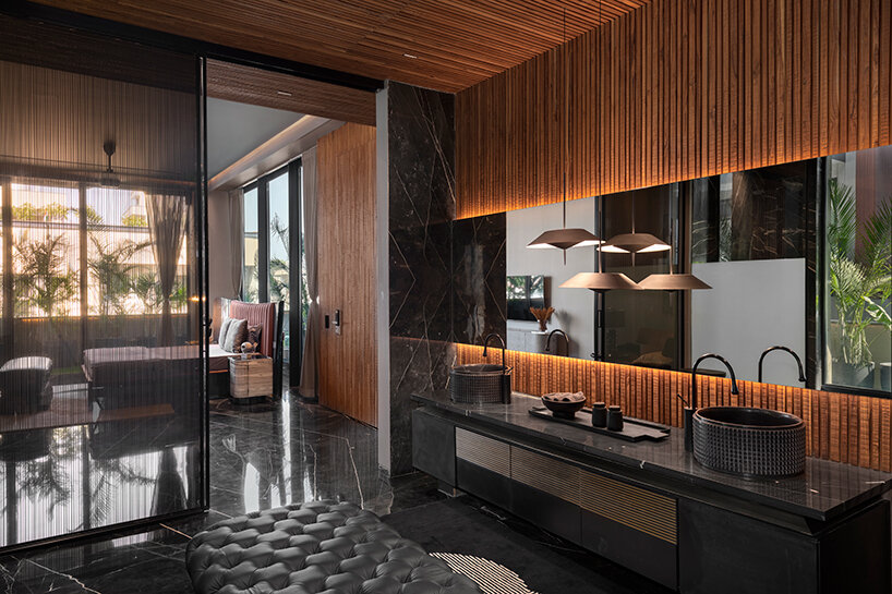 atrey and associates' brutalist home pairs climatic intelligence with material honesty