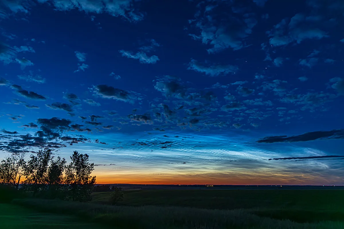 Noctilucent clouds, June 2025 June 29-30 2025, over southern Alberta, Canada. Photo by Alan Dyer/VWPics/Universal Images Group via Getty Images