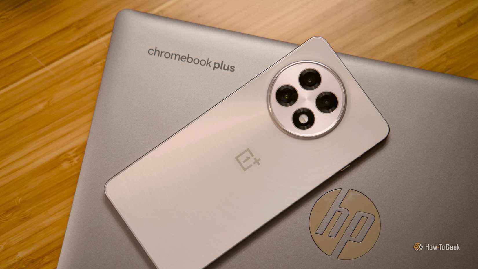 OnePlus 13R sitting on an HP Chromebook Plus.