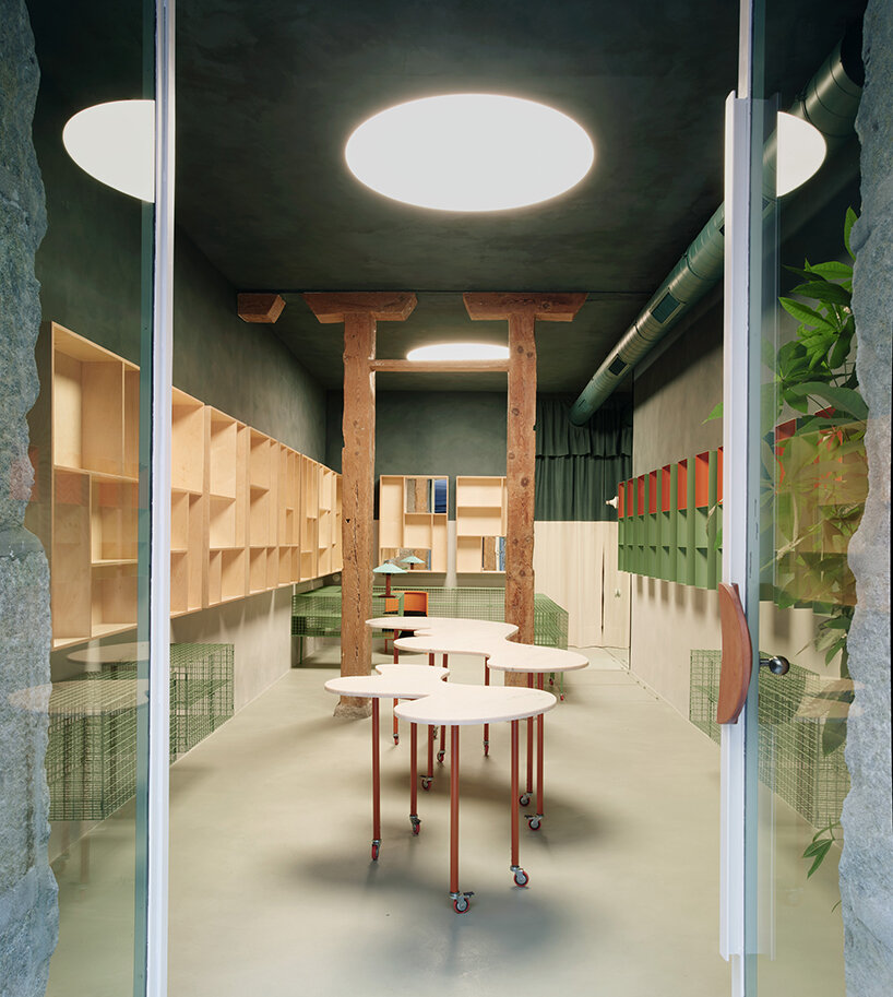 organic marble tables and vibrant hues complete madrid store by lucas y hernández-gil