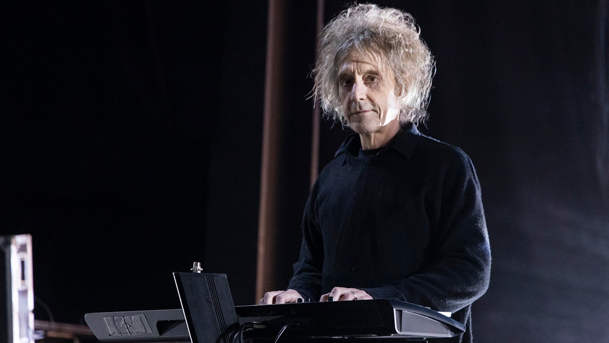 Perry Bamonte on stage performing in Michigan in June 2023.