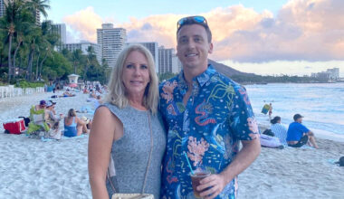 Vicki Gunvalson and her son, Michael Wolfsmith, take a photo on a beach.
