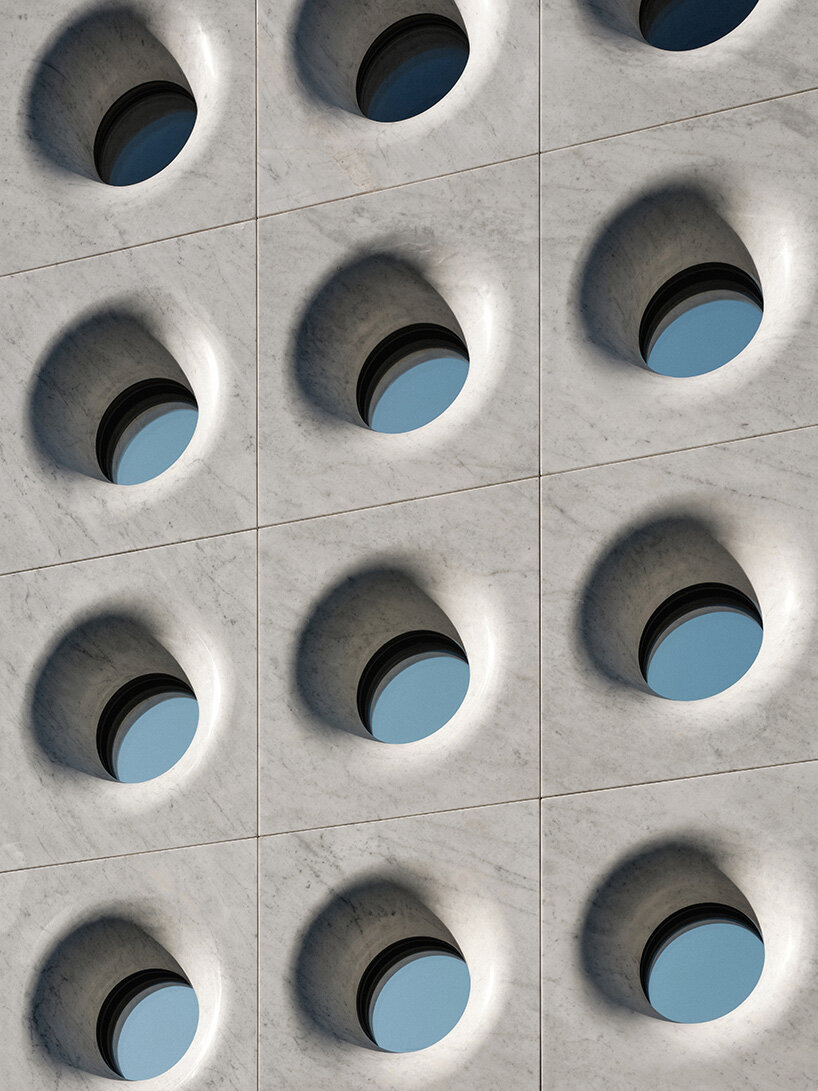 sculptural marble facade by halleroed fronts alaïa's first china flagship in beijing