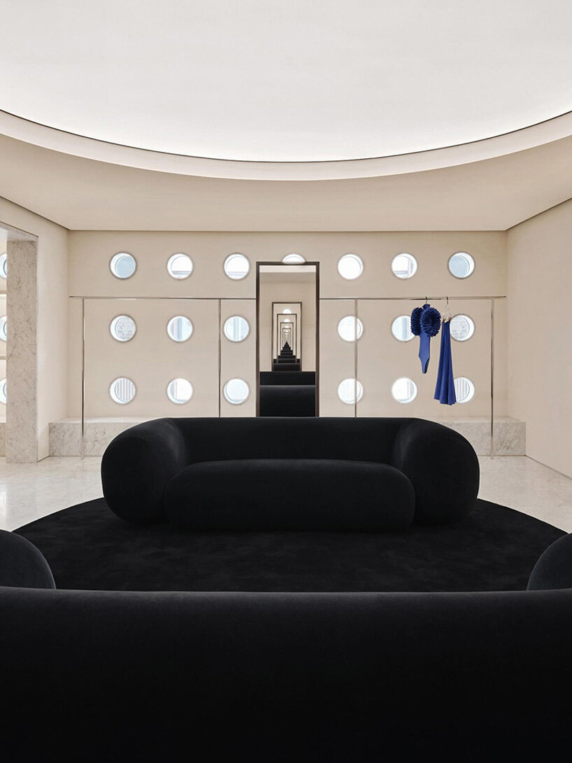 sculptural marble facade by halleroed fronts alaïa's first china flagship in beijing