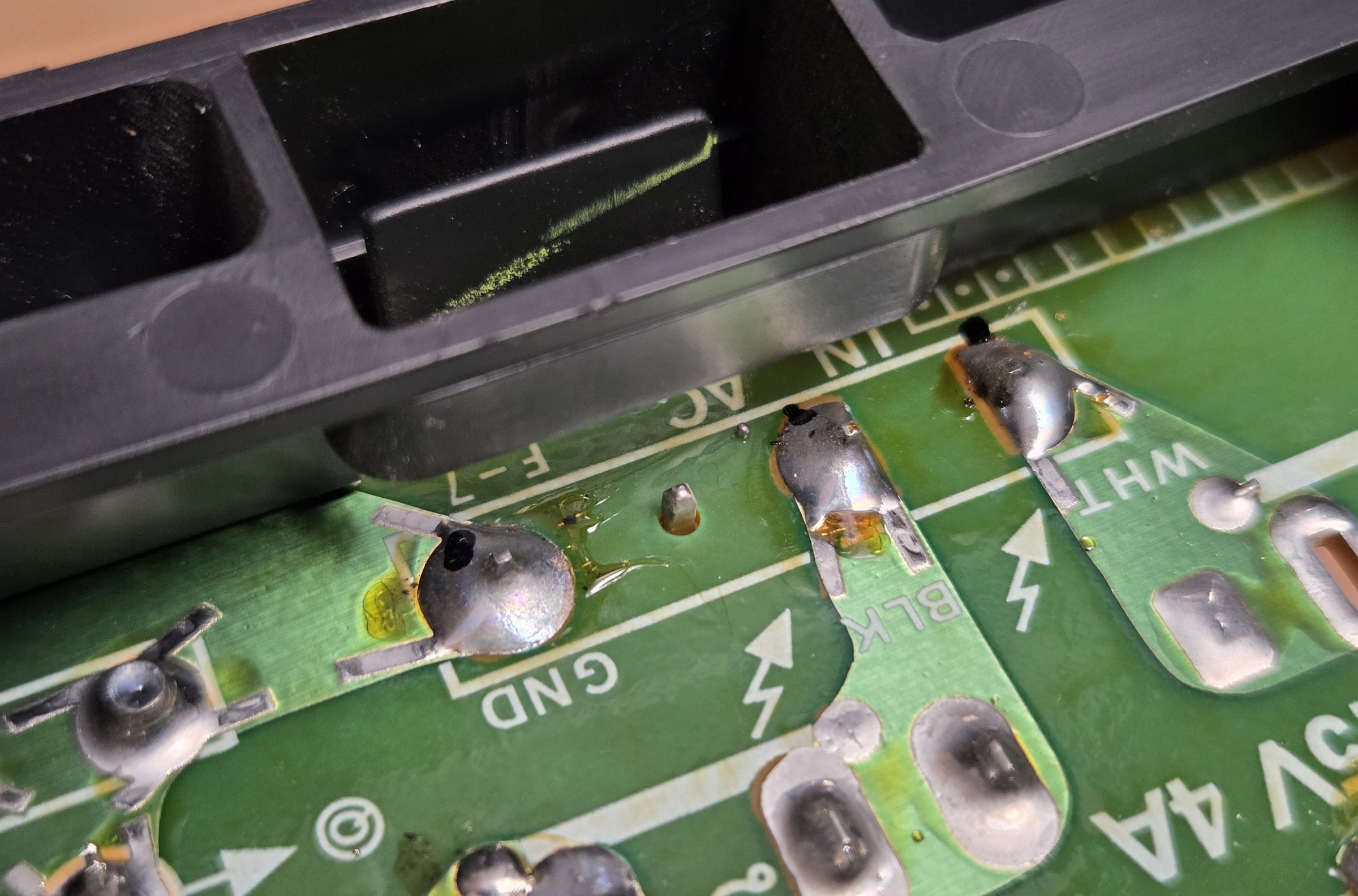 “From what I can see, there are signs of a cracked or weakened solder joint,“ FixBot wrote when I presented this photo. A CRT expert tells me these joints are fine.