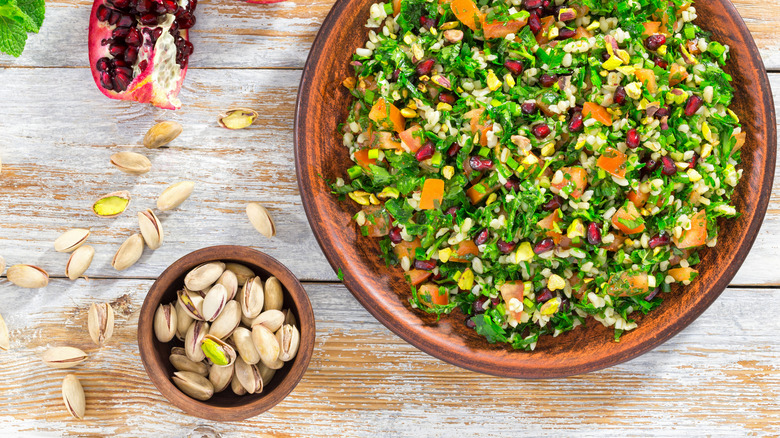 chopped salad with pistachio nuts