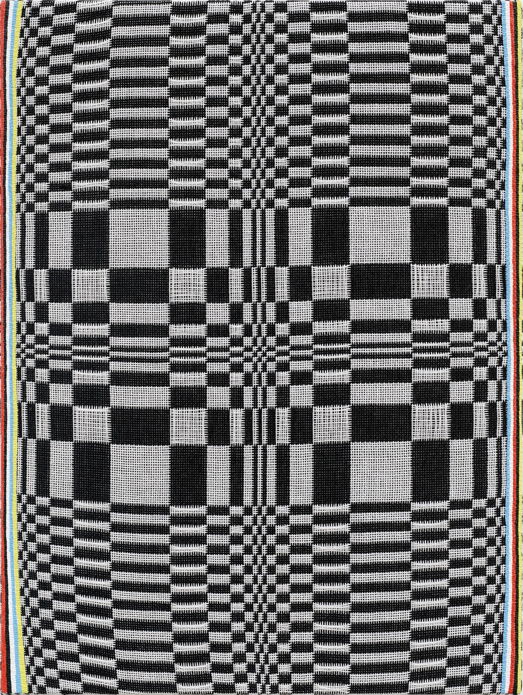 A black-and-white weaving by Samantha Bittman in an optical pattern with prismatic stripes on the edges
