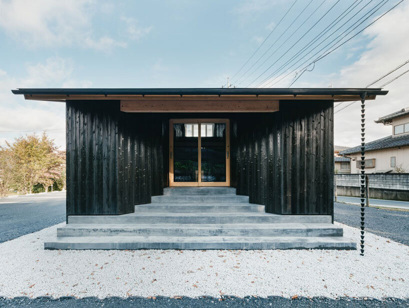 charred cedar facade enfolds kiln-inspired sauna in japan