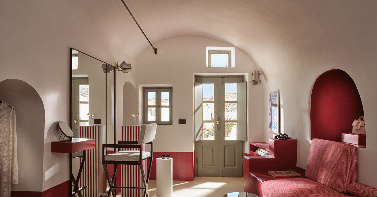 urban soul project brings bold red hotel design to santorini