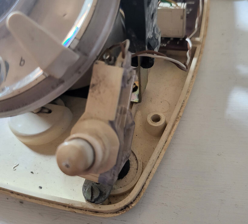 vintage rotary telephone transforms into analog-digital hybrid music player and AI voice chat