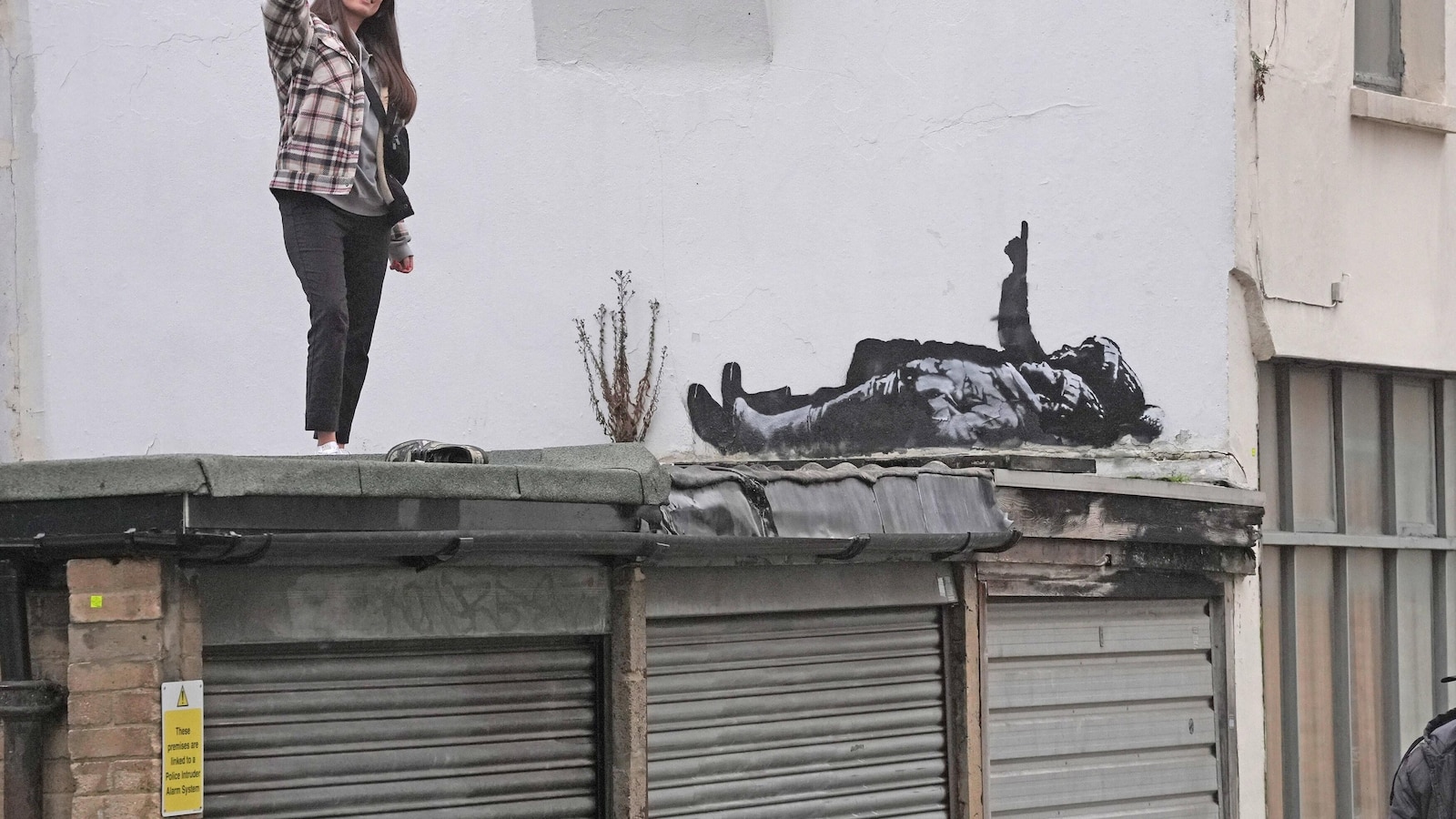 Banksy unveils new art in London following speculation over murals