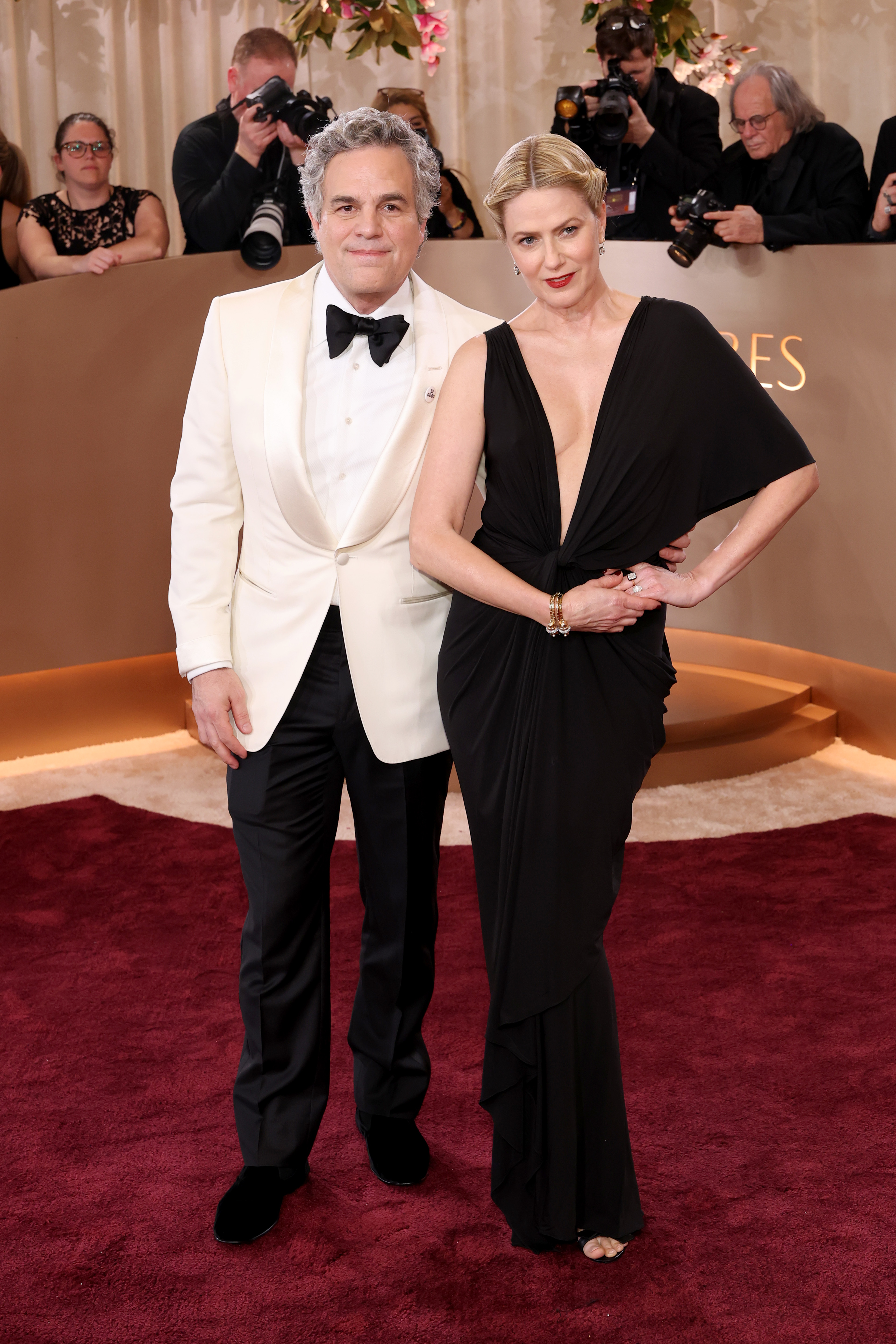 Mark Ruffalo and Sunrise Coigney attend the 83rd Annual Golden Globe Awards.