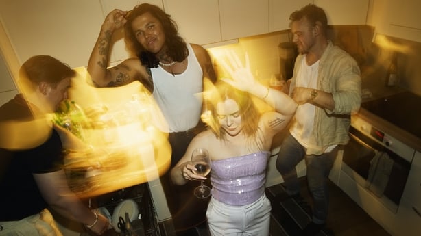 Group of friends enjoying party at home