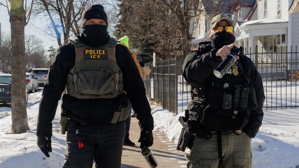 US Immigration and Customs Enforcement agents conduct immigration enforcement operations