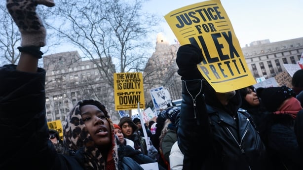 Hundreds of people attend a rally in lower Manhattan as part of a 'National Shutdown" event against ICE.