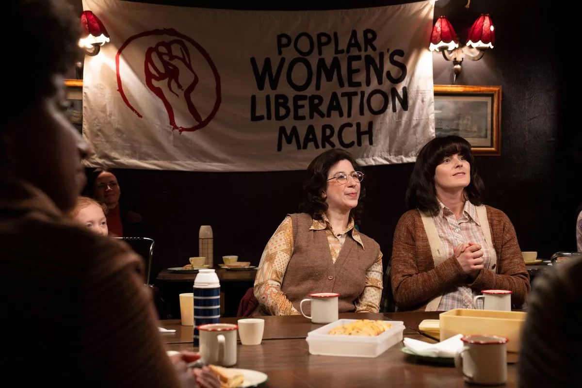 Call the Midwife's Maxine looking animated at a Women's Liberation Movement