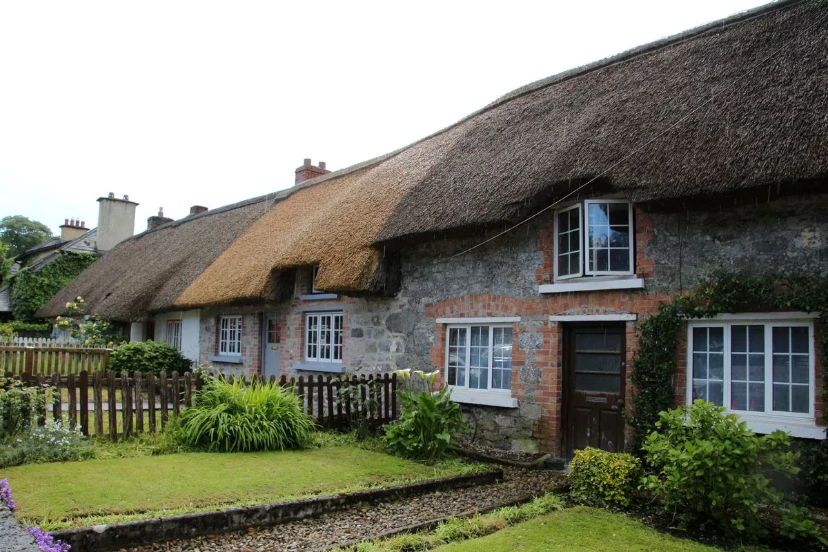 Adare, County Limerick, Ireland:-One of Adare's signature cottages on Main Street