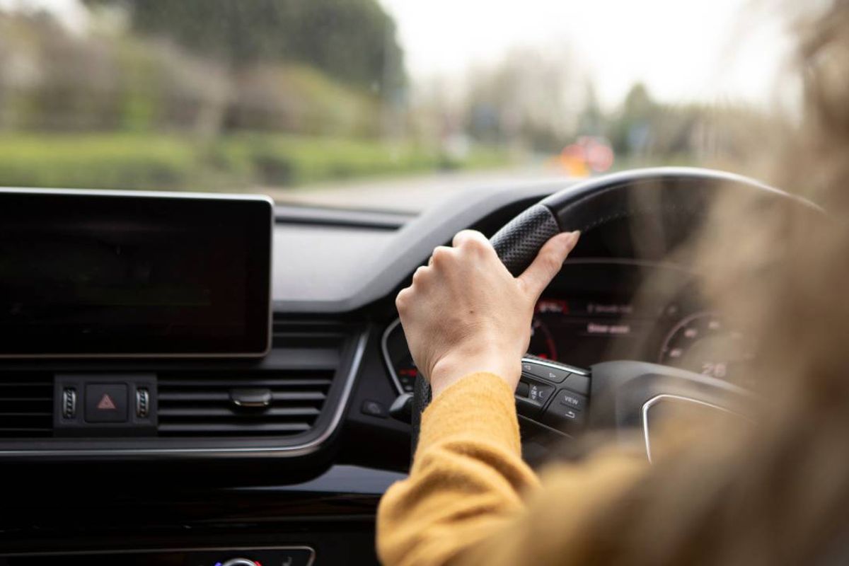 Stock image of someone driving a car