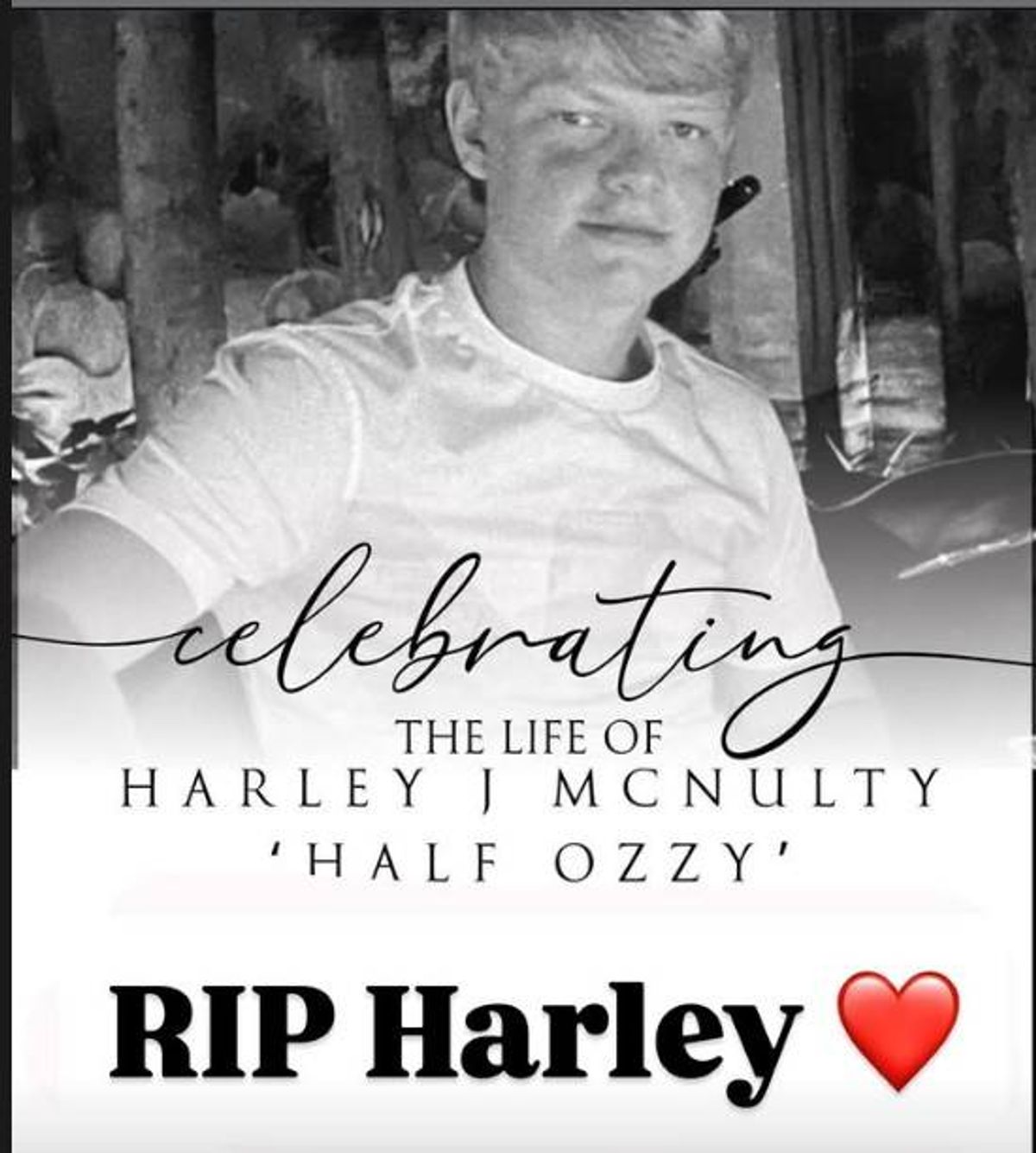 A black-and-white photograph depicts an individual in a contemplative pose, wearing a plain white t-shirt. The image is bordered with a subtle shadow effect, and the word "celebrating" is artistically inscribed across the foreground, suggesting a theme of commemoration or festivity. The background is intentionally blurred, directing focus towards the subject's expression and the inscription.