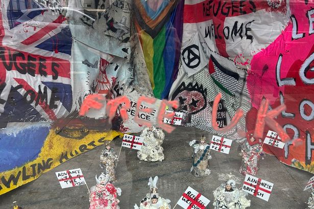 'Free UK' was written onto the exhibition window with orange lipstick