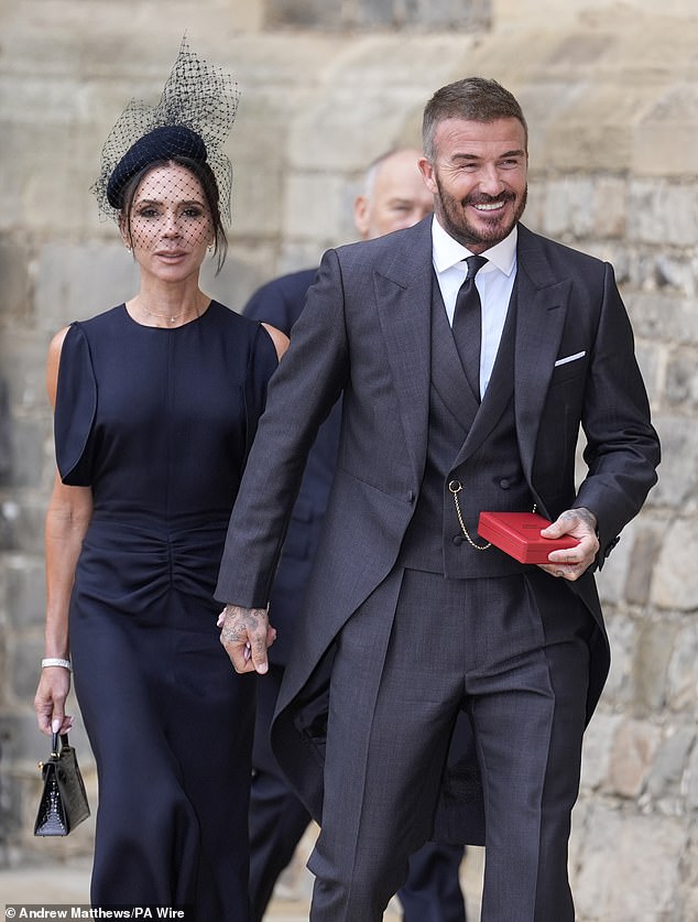 David Beckham walks with his wife Victoria after he was made a Knight at Windsor Castle on November 4, 2025