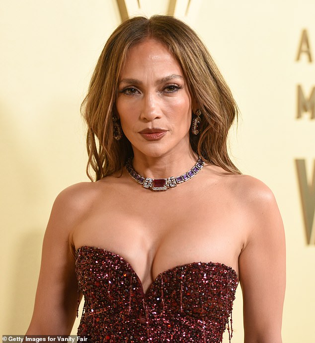 The strapless number had a corset bodice that cinched in Lopez's already tiny waistline