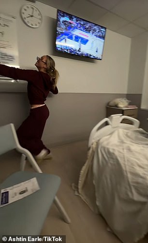 In the 25-second clip, Earle took advantage of the small space at the foot of Alisa's bed