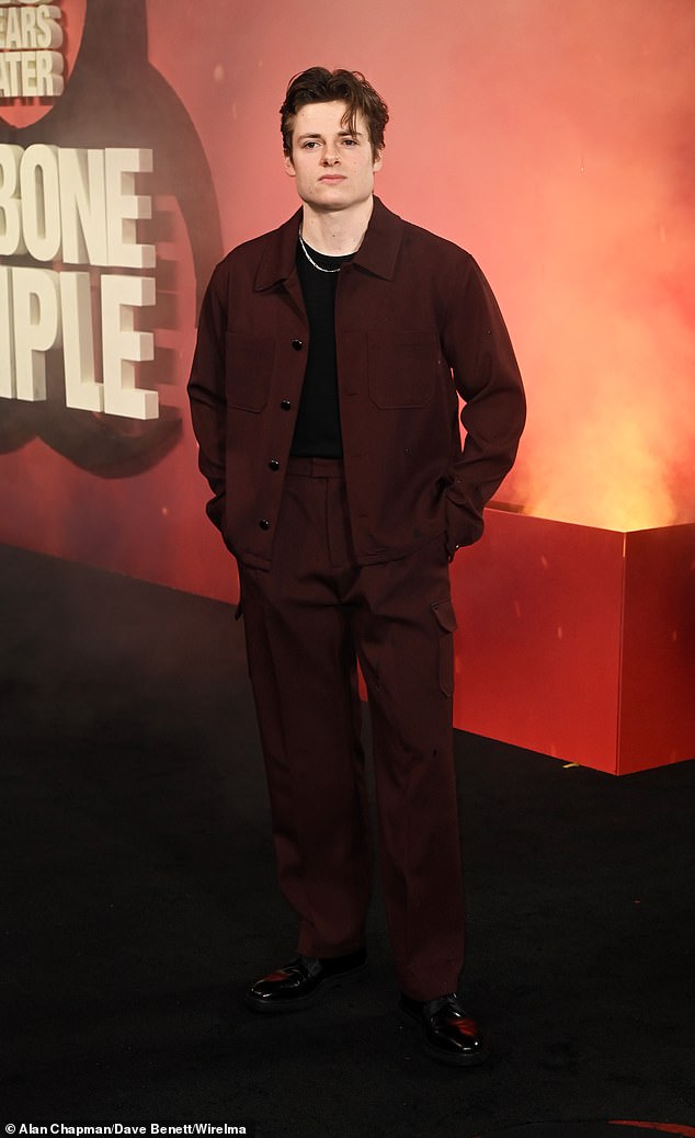 The star opted for a sharp burgundy red co-ord as he celebrated the release of the film