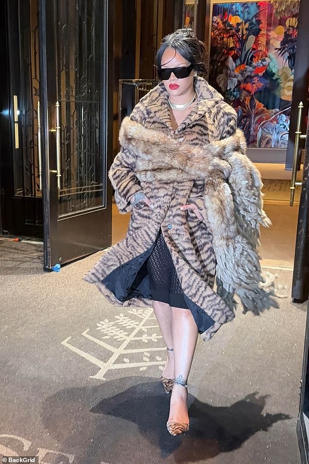 She wowed in an animal-print fur coat with matching heels and a fur shawl