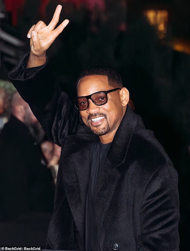 Smith and Pinkett flashed cheerful smiles while taking part in a brief photo session together and at one point, the actor was seen flashing a peace sign towards fans