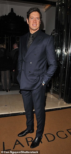 Vernon Kay looked suave in a navy suit