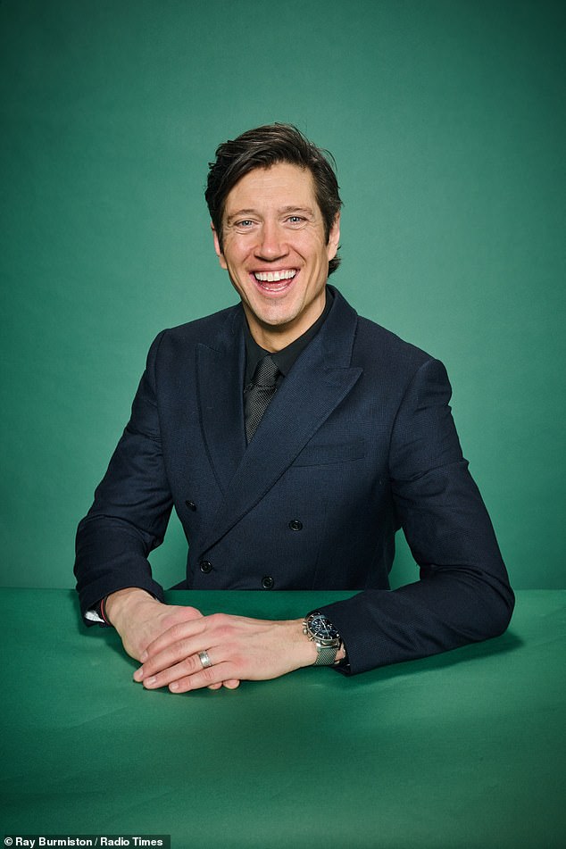 Vernon looked smart in a navvy blue suit