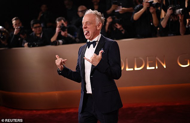 Mike White poses on the red carpet at the 83rd Annual Golden Globes in Beverly Hills, California, U.S., January 11, 2026. REUTERS/Daniel Cole