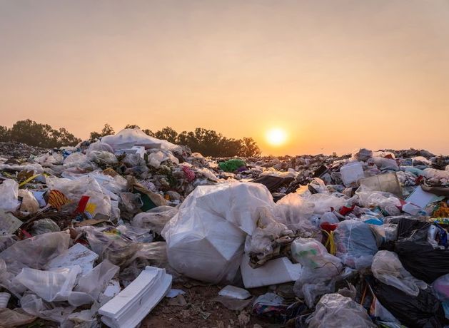 One dead and 38 people missing after landfill collapses and engulfs village