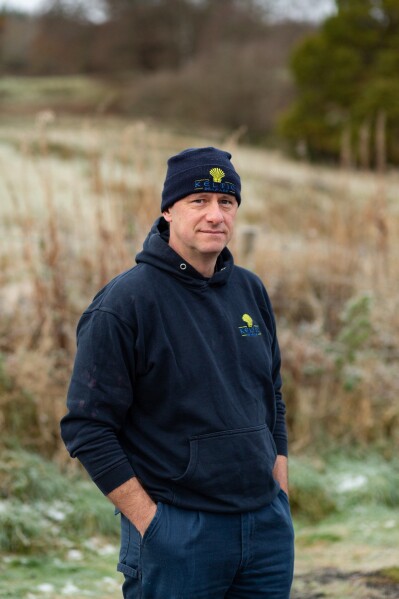 Alasdair Hughson, owner of Keltic Seafare, a company that process sustainably caught prawns, lobsters and scallops, stands for a portrait on Nov. 21, 2025, in Dingwall, Scotland. (AP Photo/Emily Whitney)