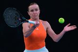 thumbnail: Elina Svitolina of Ukraine plays a forehand return to Aryna Sabalenka of Belarus during their semi-final at the Australian Open today.