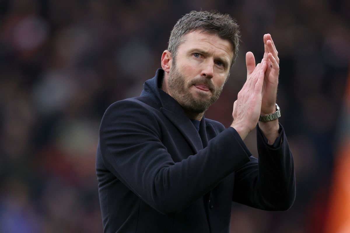 Michael Carrick applauding after Manchester United's derby win in January 2026