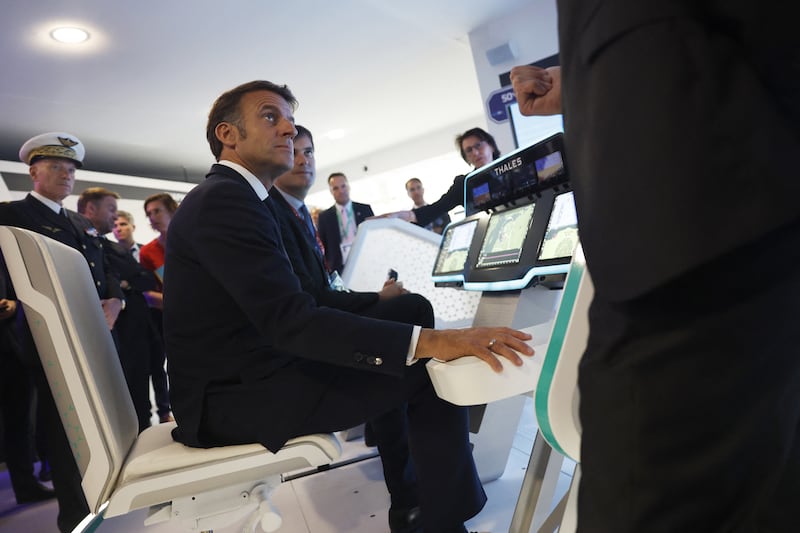 French president Emmanuel Macron at the Thales pavilion during the International Paris Air Show. Photograph: Mohammed Badra/Pool/AFP via Getty          