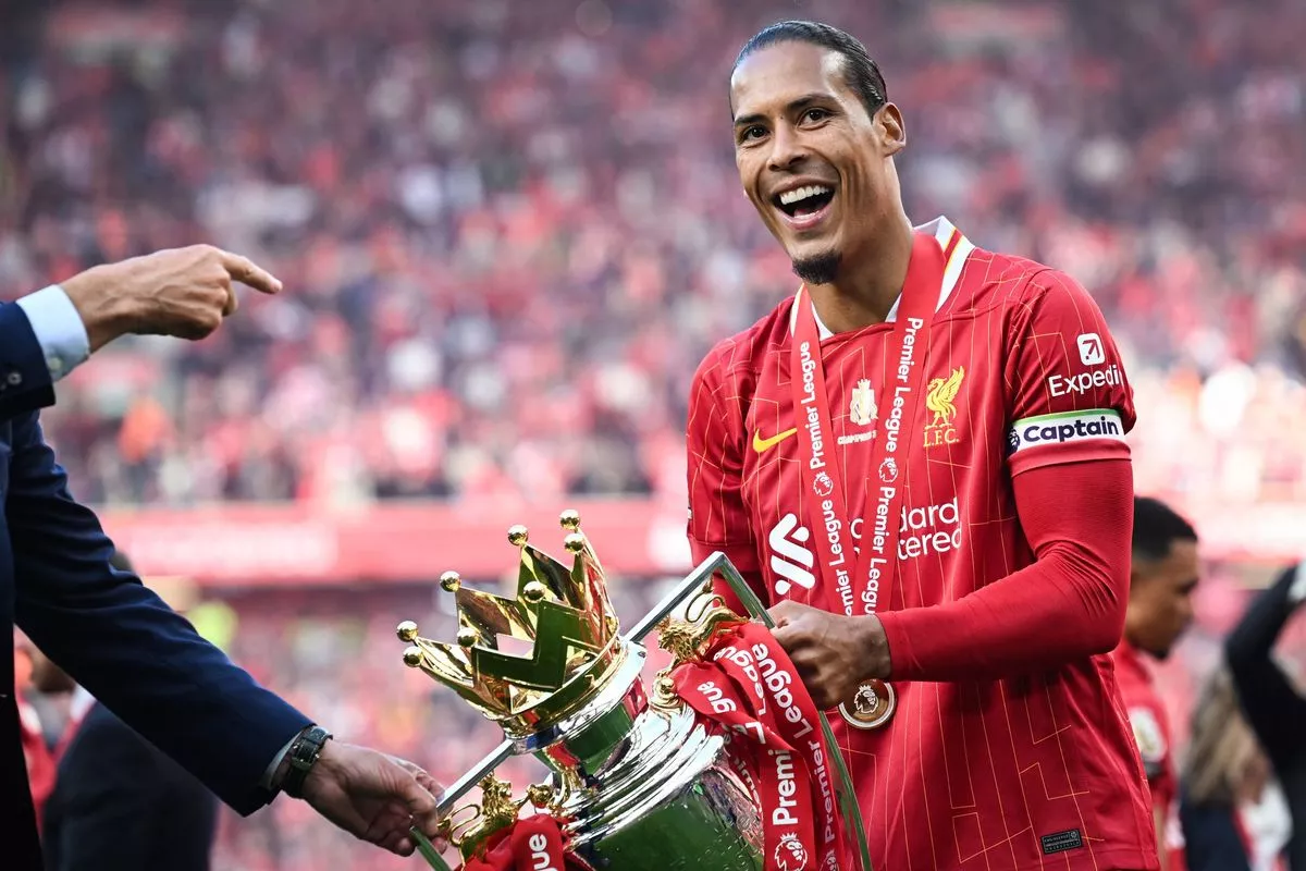 Virgil van Dijk with the Premier League trophy
