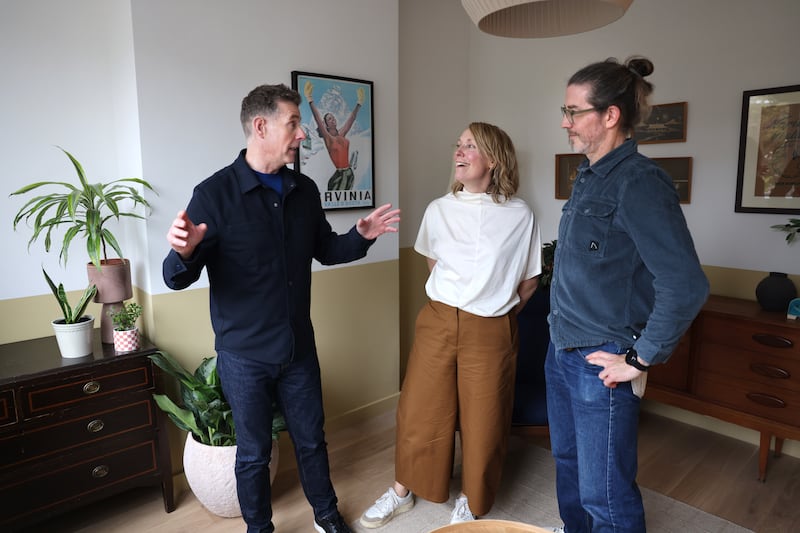 Dermot Bannon with homeowners Louis and Norita O’Donoghue during filming for Room to Improve at their home in Raheny, Dublin.
Photograph: Dara Mac Dónaill