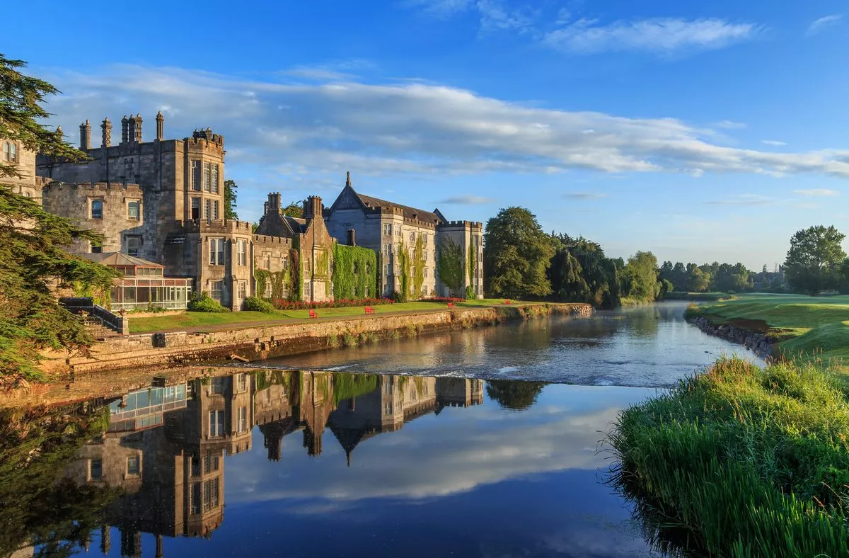 Adare Manor in Co Limerick. The old castle can be seen behind a small lake on a clear day. 