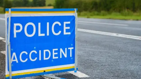 Getty Images A close-up of a police sign saying 'police accident' on a roadside