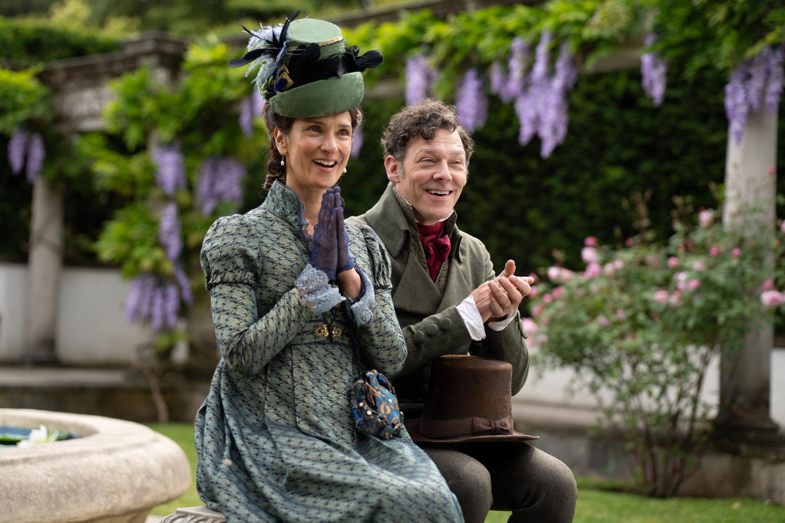 Image may contain Richard Coyle Indira Varma Person Adult Face Head Clothing and Coat
