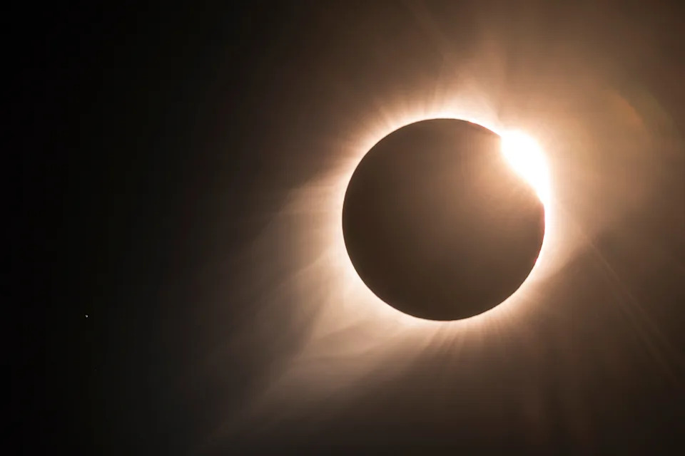 A photograph of a solar eclipse near totality.