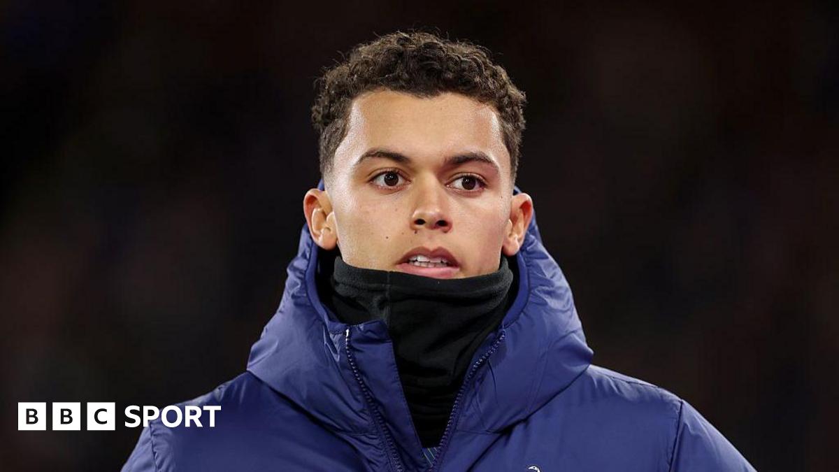 Brennan Johnson wearing a coat and snood