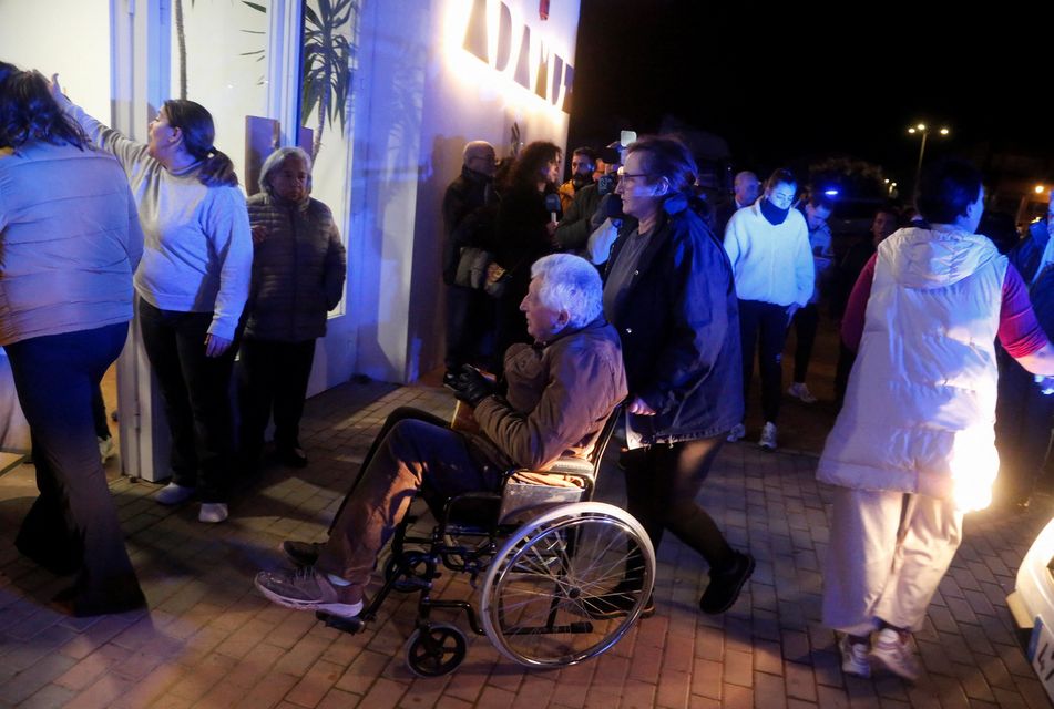 A person affected by a deadly train derailment is transferred for treatment to the Caseta Municipal in the town of Adamuz, after a high-speed train derailed and collided with another oncoming train, near Cordoba, Spain, January 18, 2026. REUTERS/Alex Gallegos